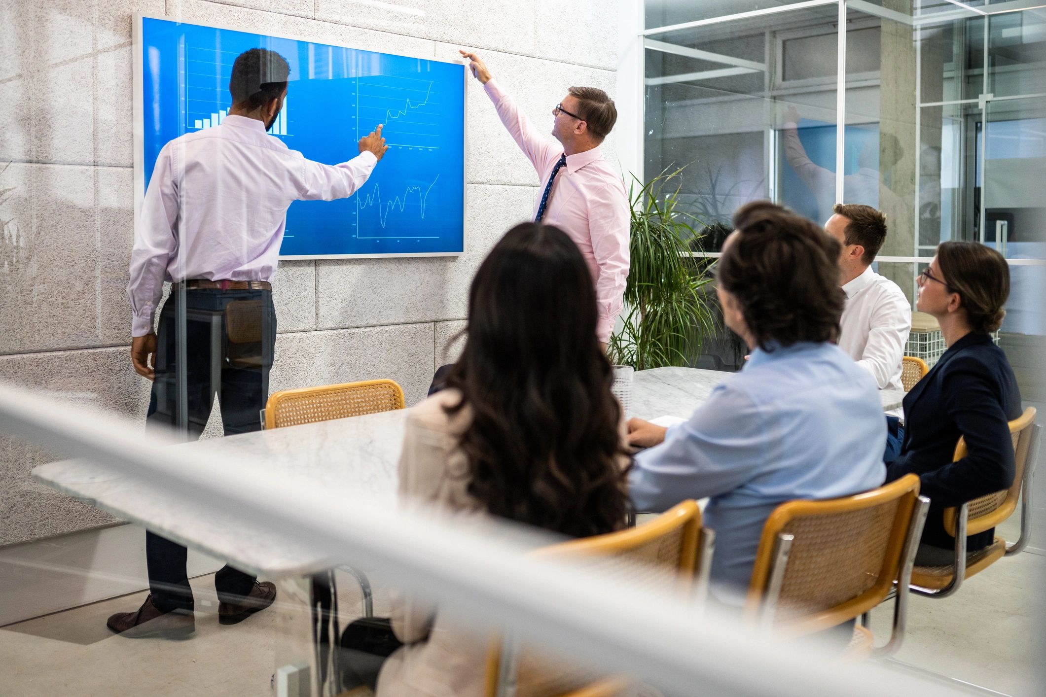 Business team reviewing analytics presentation